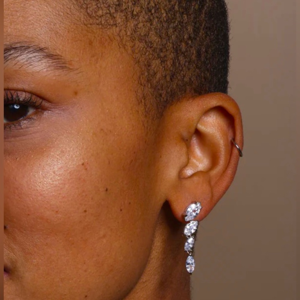 Melinda María “She’s so fierce” Earrings. Sold as a pair. White CZ, 31mm long.